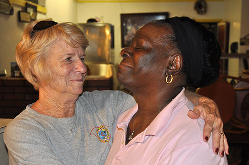 SC ERT member Becky Allen and Shirley Abraham get in a big emotional hug after  ERT members helped muck-out Abraham’s building and family restaurant in Holly Hill and Abraham cooked the tired and hungry team a big supper